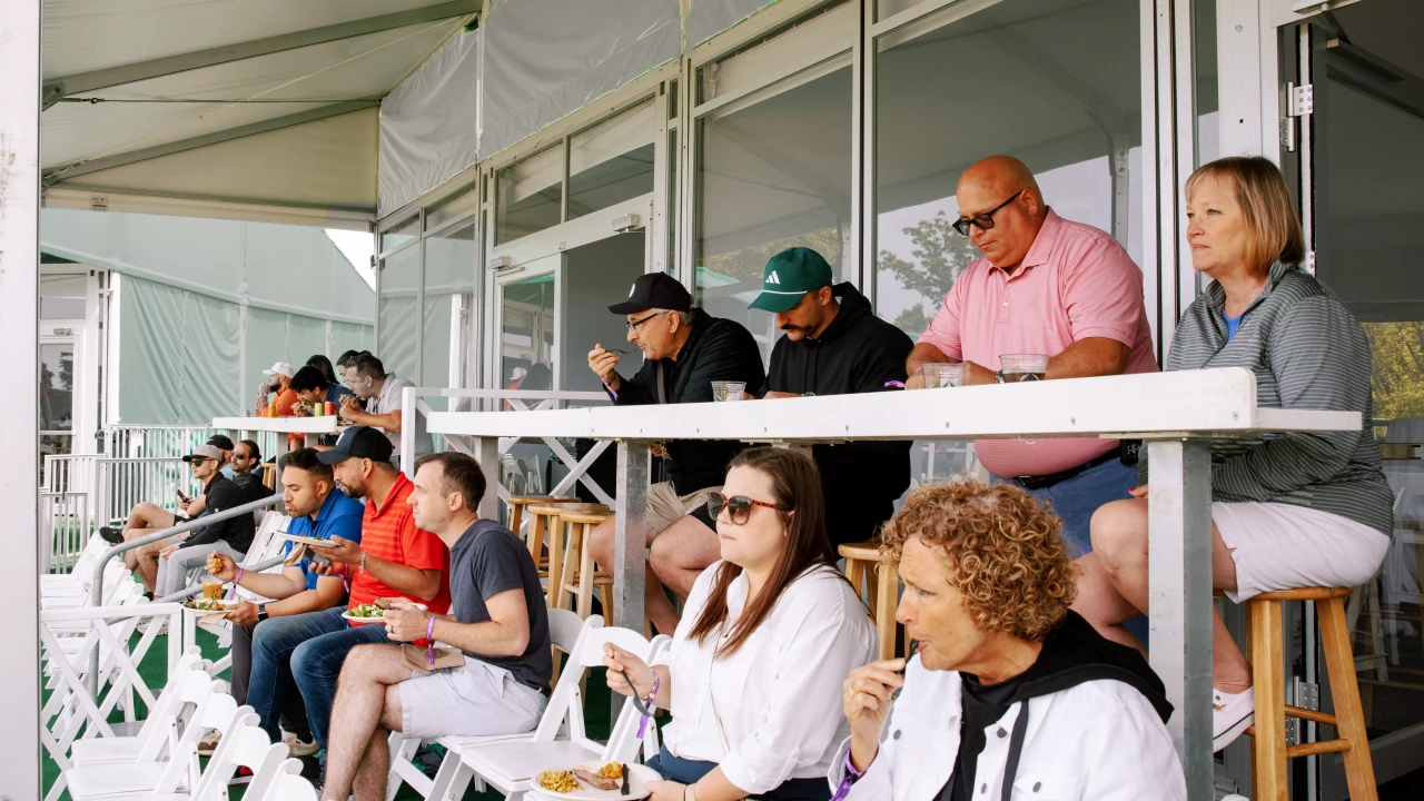 Guests seated in a hospitality viewing area during the Good Good Championship in Texas.