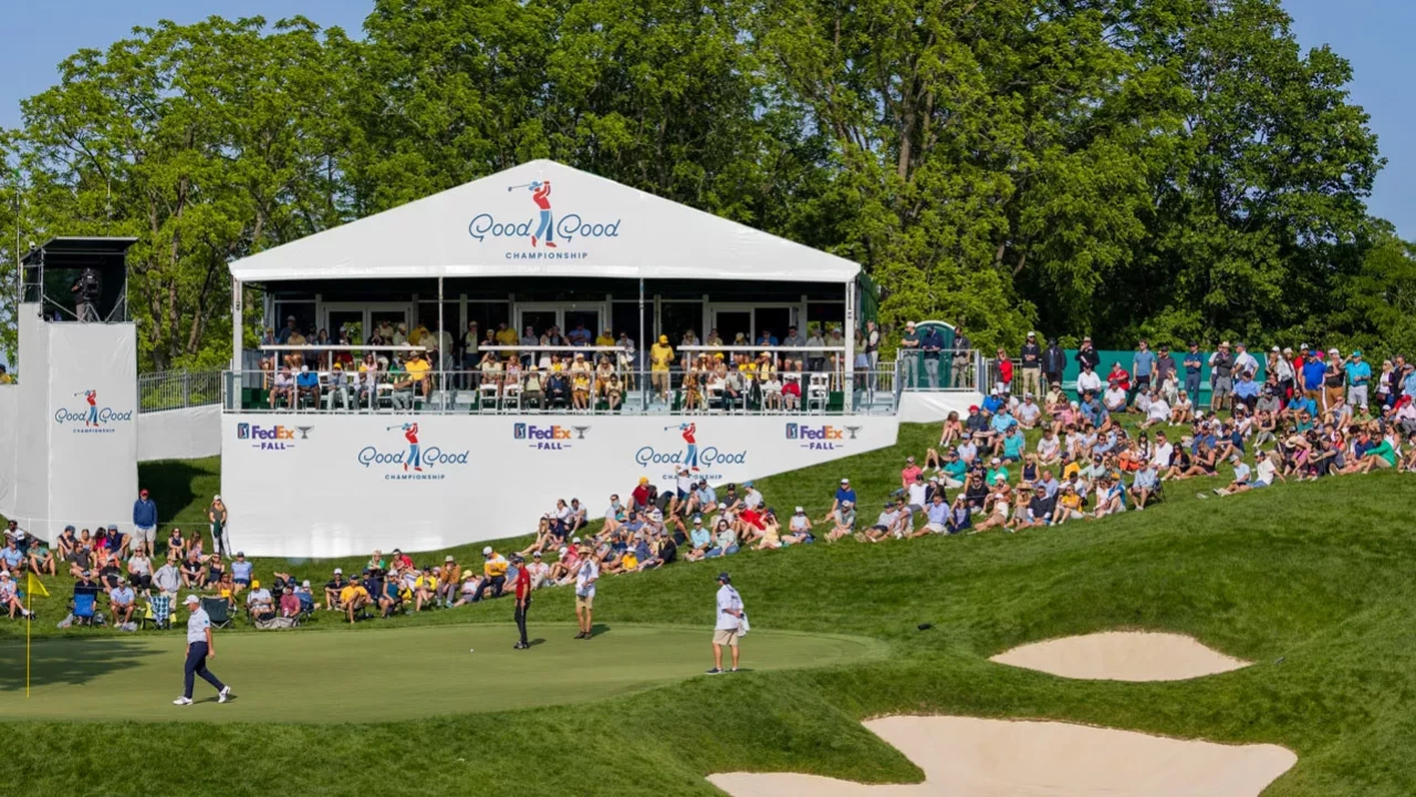 Spectators surrounding the green at the Good Good Championship golf tournament.